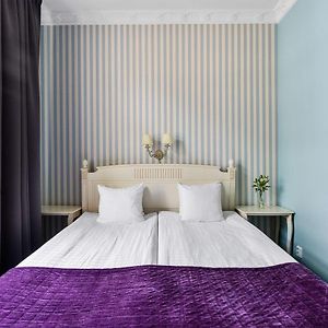 Kamer met een Queen Size Bed